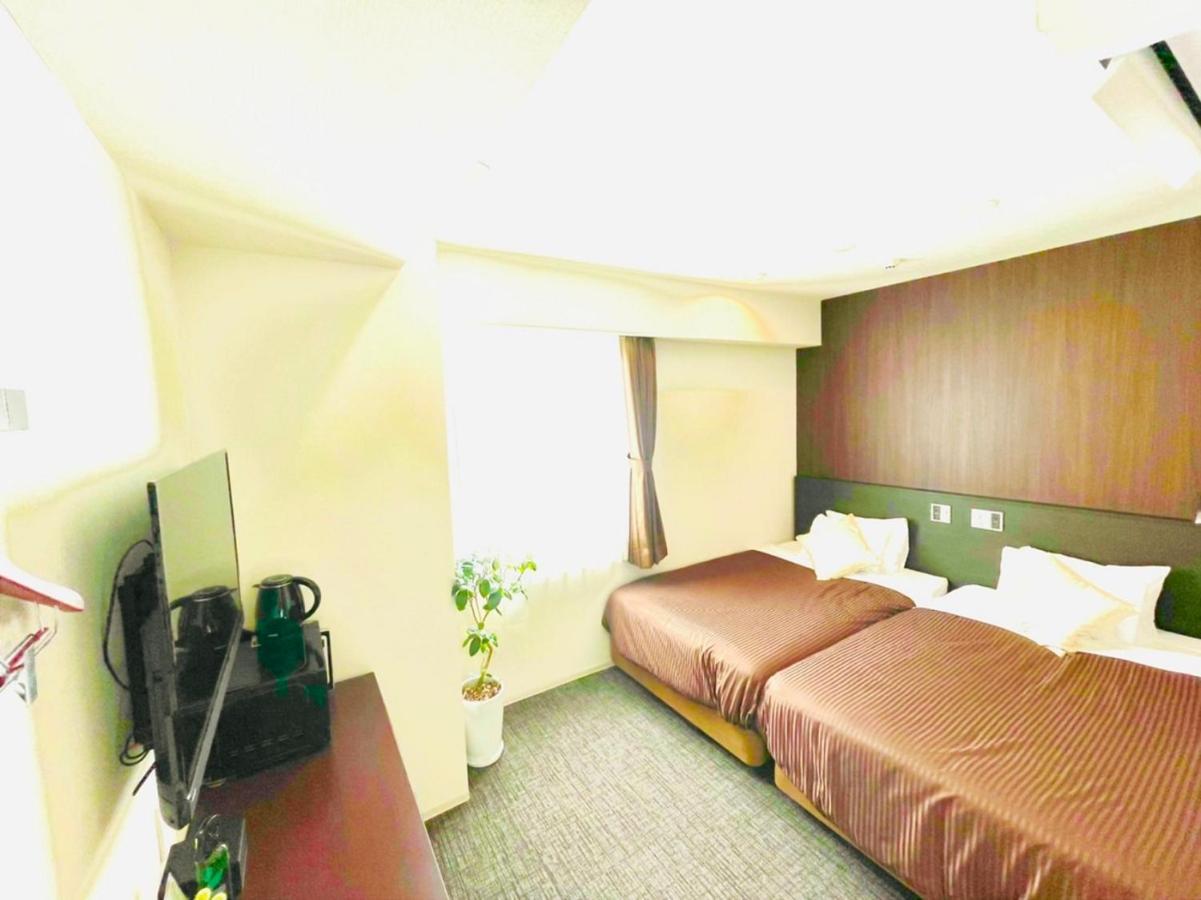 Natural Hot Spring Hotel Livemax Premium Hiroshima Exterior foto